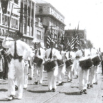 Drum and Bugle Corps parade on Texas St.